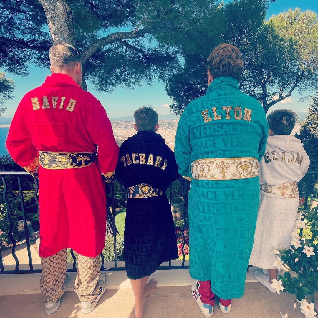 Elton John Shares Rare Photo of His Twins in Personalized Versace Robes