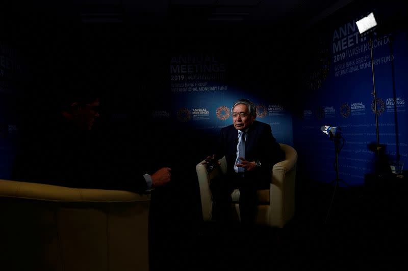 FILE PHOTO: Bank of Japan (BOJ) Governor Haruhiko Kuroda, speaks during an interview with Reuters in Washington