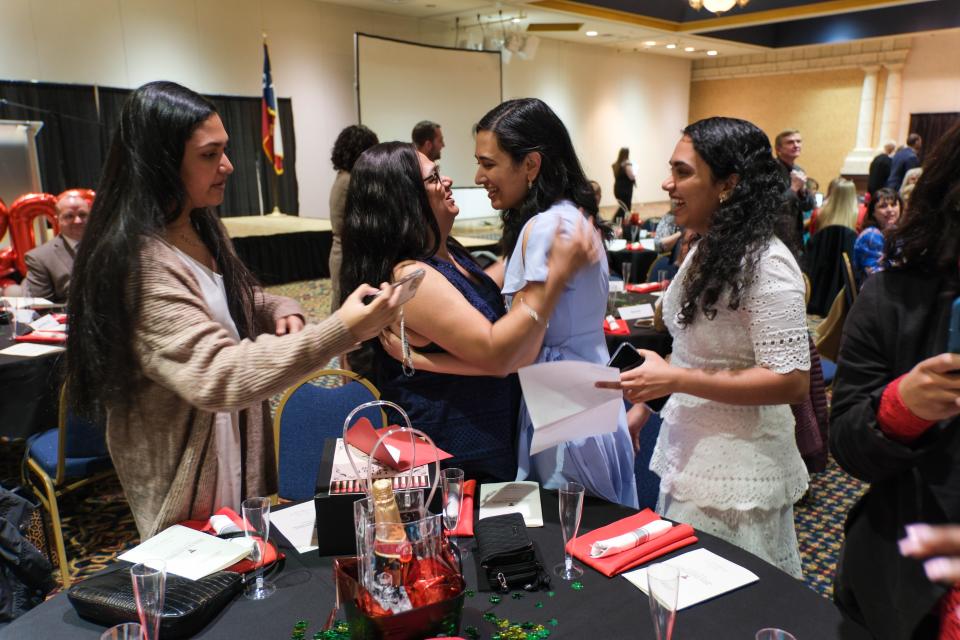 Nikita Sankoonrikkal gets a hug from her mom as she finds out her residency assignment at the 2023 TTUHSC Match Day held in downtown Amarillo.
