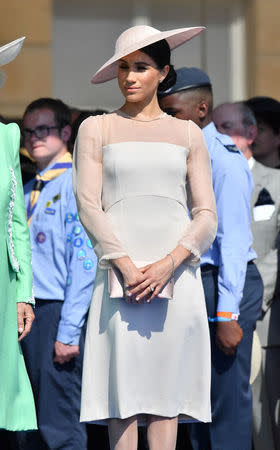 Meghan, Duchess of Sussex attends a garden party at Buckingham Palace, in London, Britain May 22, 2018. Dominic Lipinski/Pool via Reuters