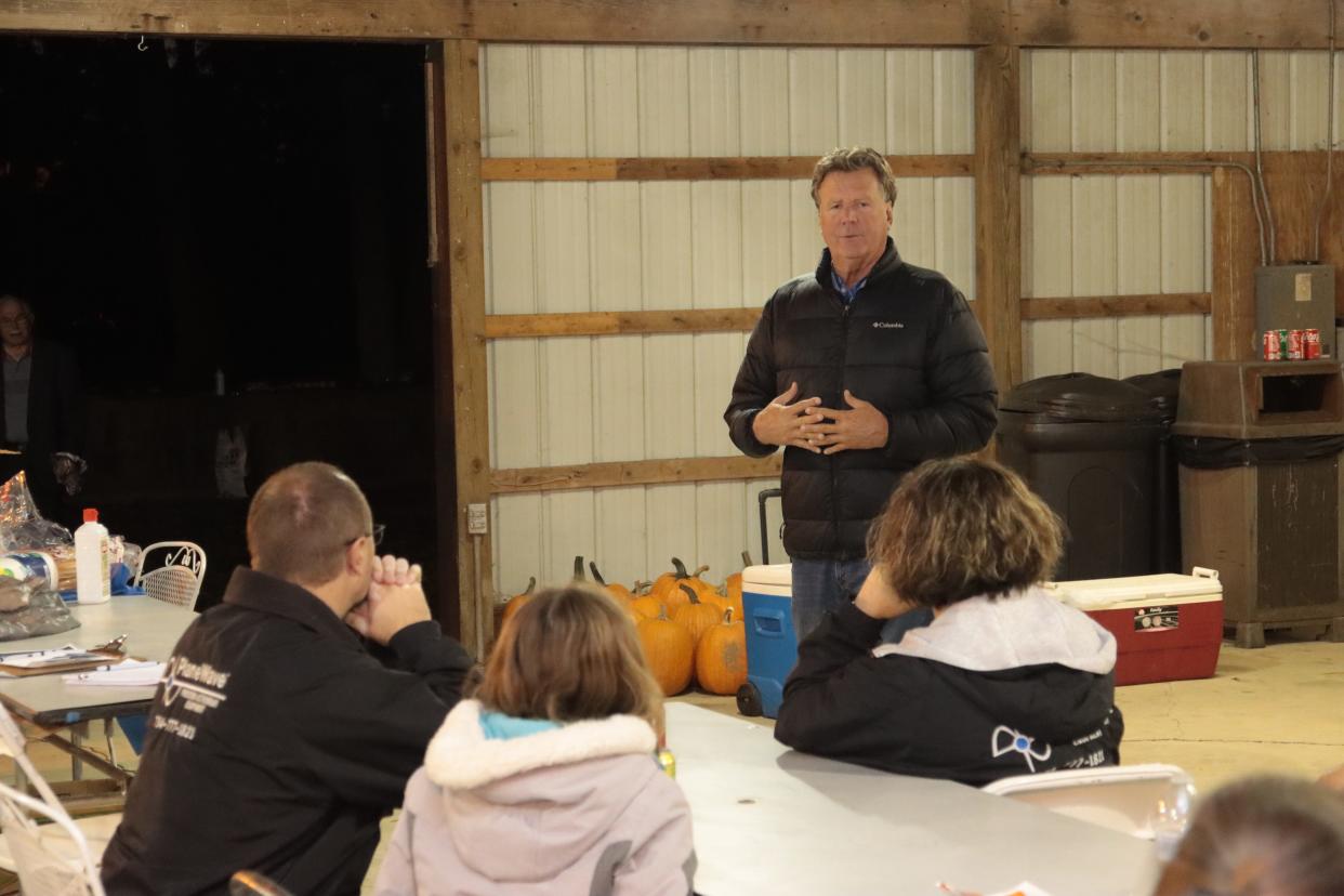 Gavin Brown, executive director of the Michigan Aerospace Manufacturers Association, addresses supporters of state Sen. Dale Zorn, R-Onsted, at an election campaign event Zorn had Saturday, Oct. 8, 2022, at PlaneWave Instruments in Adrian.