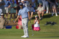 J.J. Spaun watches his putt on the 18th green during the third round of the St. Jude Championship golf tournament, Saturday, Aug. 13, 2022, in Memphis, Tenn. (AP Photo/Mark Humphrey