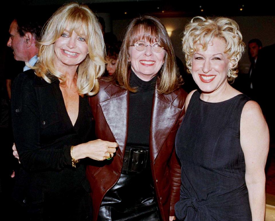 Goldie Hawn (L), Diane Keaton (C) and Bette Midler pose together at the Premiere of the new Paramount Pictures film "The Wives Club" September 16. Hawn, Keaton and Midler all star in the film.