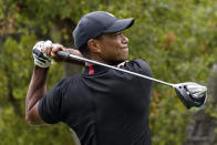 Tiger Woods hits from the 11th tee during the first round of the Zozo Championship golf tournament Thursday, Oct. 22, 2020, in Thousand Oaks, Calif. (AP Photo/Marcio Jose Sanchez)