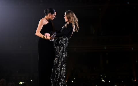 Duchess of Sussex presents the award for British Designer of the Year Womenswear Award to Clare Waight Keller for Givenchy - Credit: Getty