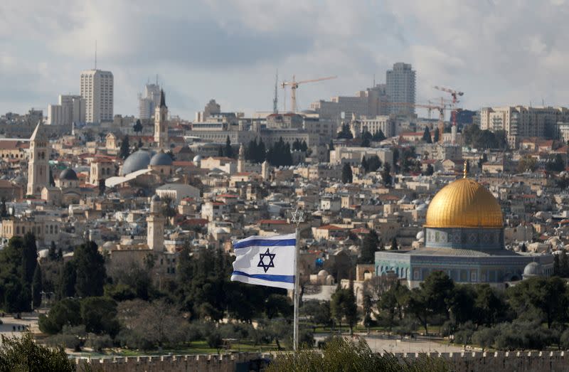 An Israeli flag is seen near the Dome of the Rock, located in Jerusalem's Old City on the compound known to Muslims as Noble Sanctuary and to Jews as Temple Mount