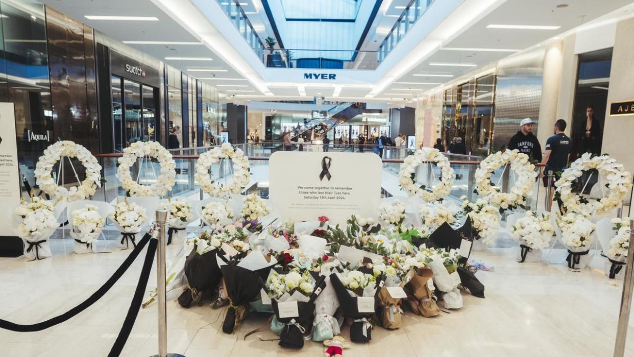 A memorial been setup inside Westfield Bondi Junction were tragic scenes unfolded last week which saw Joel Cauchi, 40, kill six people inside the shopping centre. Picture: NCA NewsWire / Dion Georgopoulos