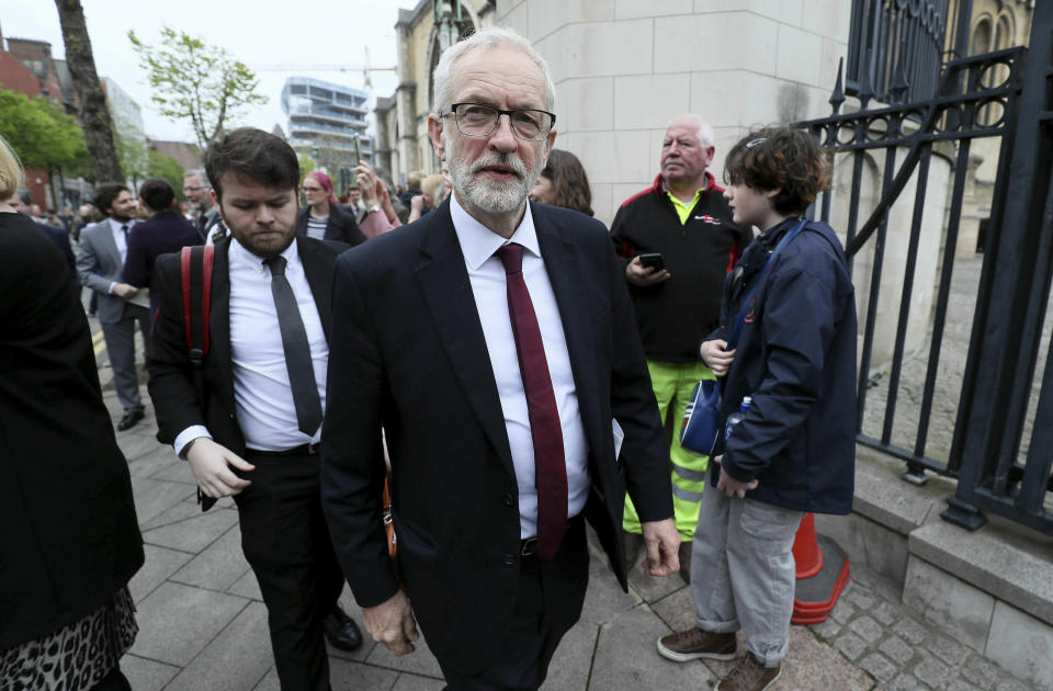 Labour Party leader Jeremy Corbyn  leaves after the funeral service of journalist Lyra McKee, at St Anne's Cathedral in Belfast, northern Ireland, Wednesday April 24, 2019. The leaders of Britain and Ireland joined hundreds of mourners Wednesday at the funeral of Lyra McKee, the young journalist shot dead during rioting in Northern Ireland last week. (Brian Lawless/PA via AP)