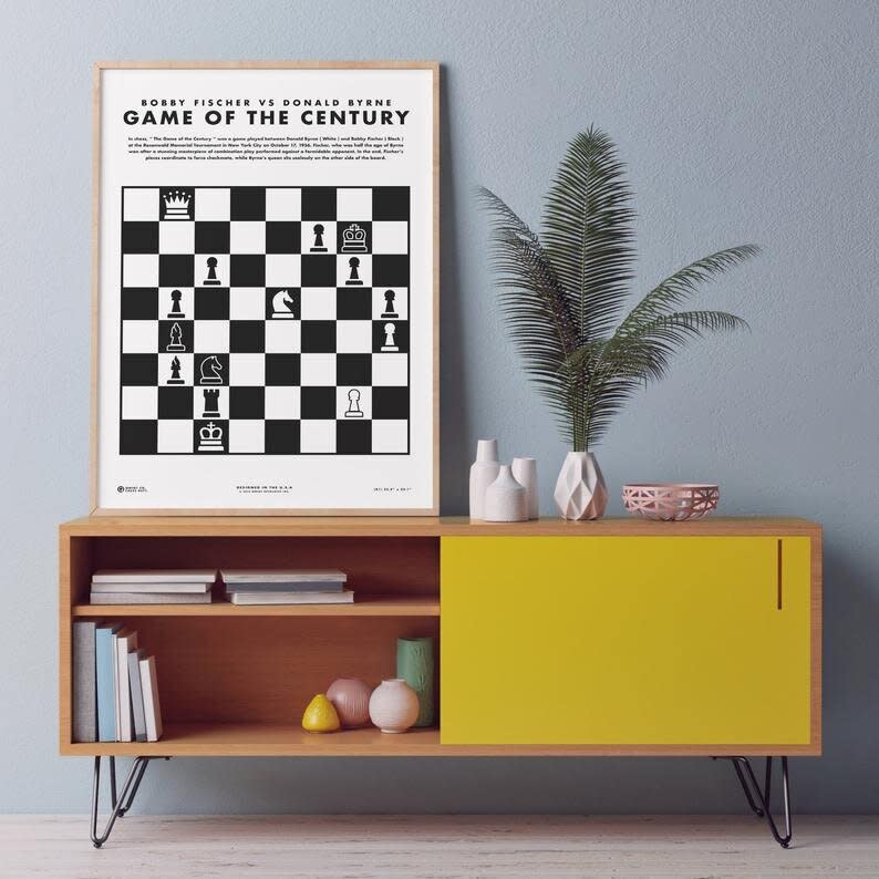 For those who might not know, a 1956 game between Donald Bryne and 13-year-old (!!!) Bobby Fischer was called the <a href="https://www.newyorker.com/magazine/1957/09/07/prodigy-3" target="_blank" rel="noopener noreferrer">&ldquo;the game of the century" by Chess Review</a>. If fans are looking for a blast from the past (this game was around the same time that the beginning of the show takes place), this printable poster commemorates the checkmate that made that game so famous. <a href="https://fave.co/3g9qFaf" target="_blank" rel="noopener noreferrer">Find it for $15 on Etsy</a>. 