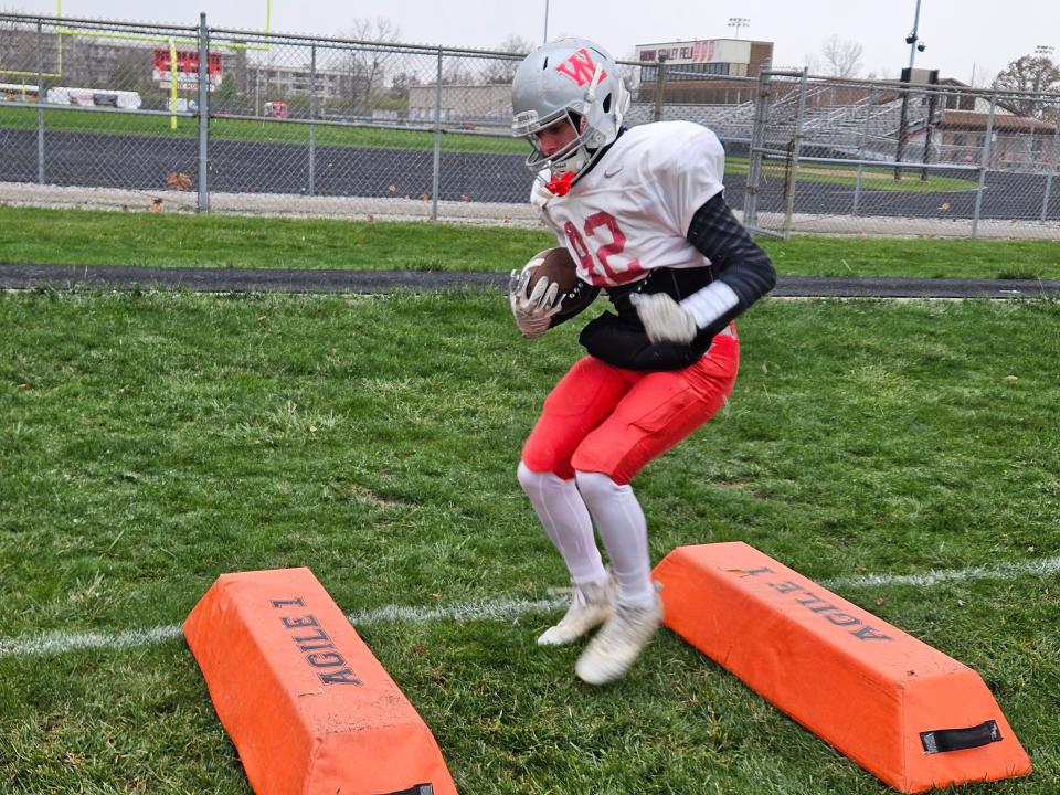 West Lafayette sophomore Martin Gazo has played a vital role in game preparation by playing scout team running back and free safety is seen practicing a run cut drill on Tuesday, Oct. 31, 2023.