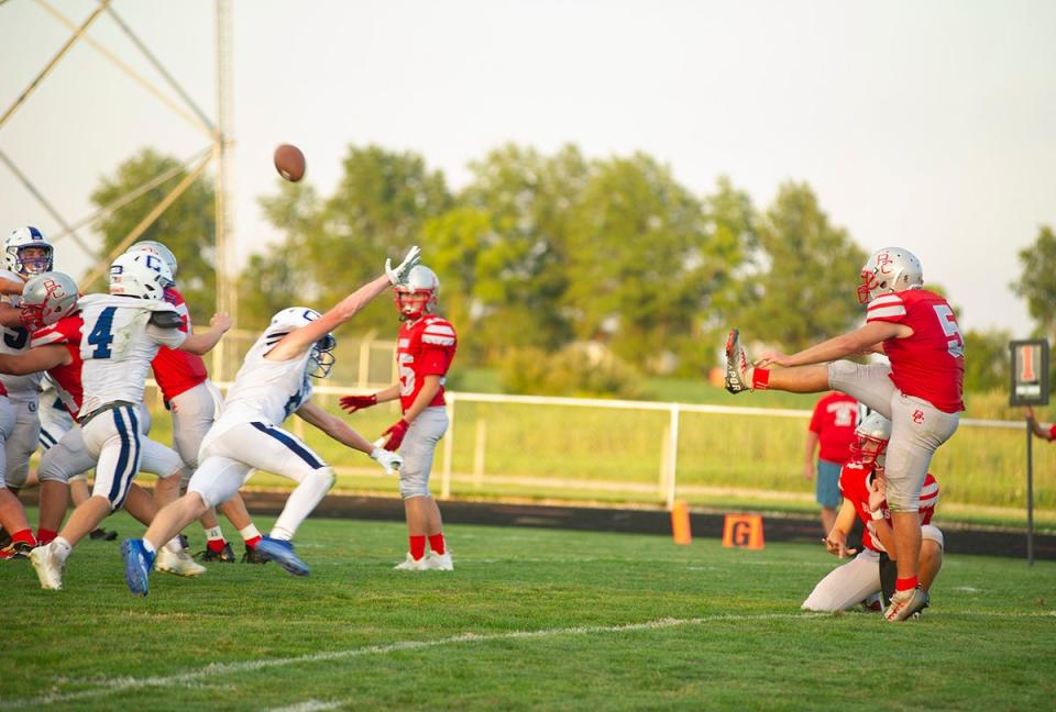 Buckeye Central's Dominic Dean kicks an extra point.