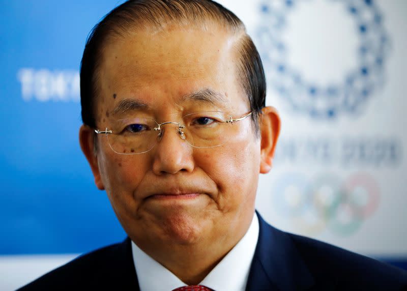 Toshiro Muto, Tokyo 2020 Organizing Committee CEO, listens to a question during an interview with Reuters in Tokyo