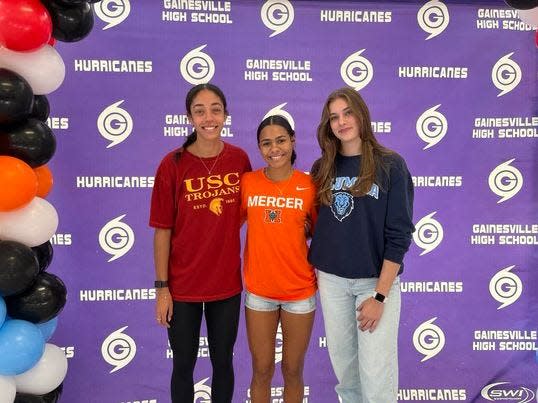 From left to right: Gainesville High volleyball seniors Brooklyn Tealer, Meme Davis and Charlotte Gravlee at their signing day ceremony at Gainesville High School on Wednesday November 8, 2023.