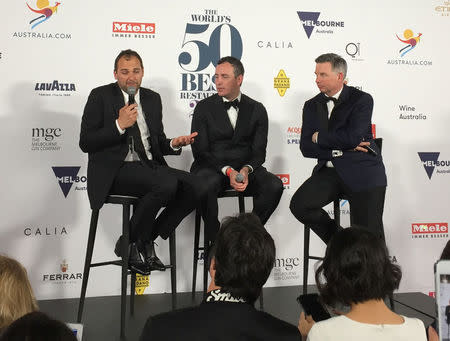 Co-owners of the restaurant Eleven Madison Park Daniel Humm (L) and Will Guidara (C) talk at a press conference during the 50 Best Restaurants awards in Melbourne, Australia April 5, 2017. REUTERS/Sonali Paul