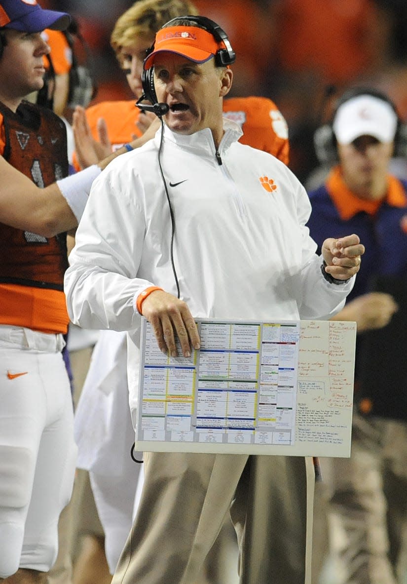 Clemson offensive coordinator Chad Morris during the 4th quarter of the Chick-fil-A Bowl Monday, December 31, 2012 in the Georgia Dome in Atlanta. BART BOATWRIGHT/Staff