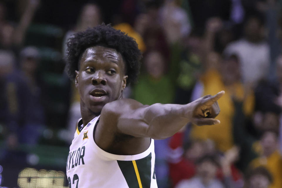 Baylor forward Jonathan Tchamwa Tchatchoua reacts to his 3-point shot against Oklahoma during the second half of an NCAA college basketball game Wednesday, Feb. 8, 2023, in Waco, Texas. (AP Photo/Rod Aydelotte)