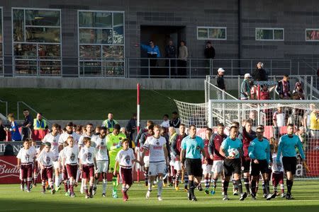 May 28, 2016; Commerce City, CO, USA; Colorado Rapids and Philadelphia Union players enter the pitch prior to the match at Dick's Sporting Goods Park. The match ended in a 1-1 draw. Mandatory Credit: Isaiah J. Downing-USA TODAY Sports