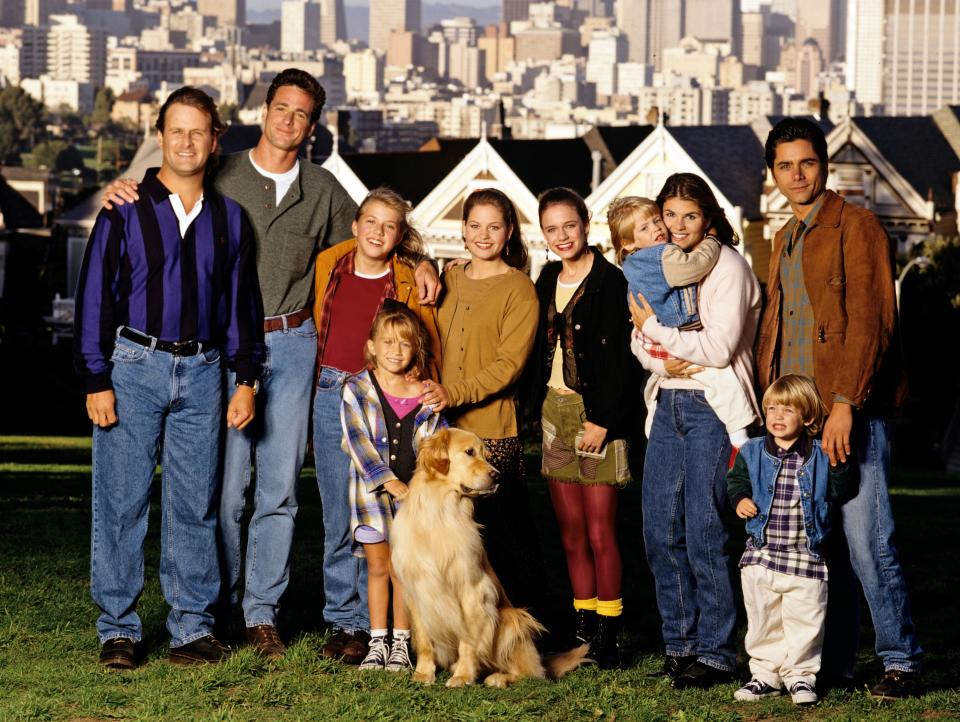 From left: Dave Coulier, Bob Saget, Jodie Sweetin, Mary Kate Olsen, Candace Cameron, Andrea Barber, Blake Tuomy-Wilhoit, Lori Loughlin, Dylan Tuomy-Wilhoit, and John Stamos pose in front of the Painted Ladies.