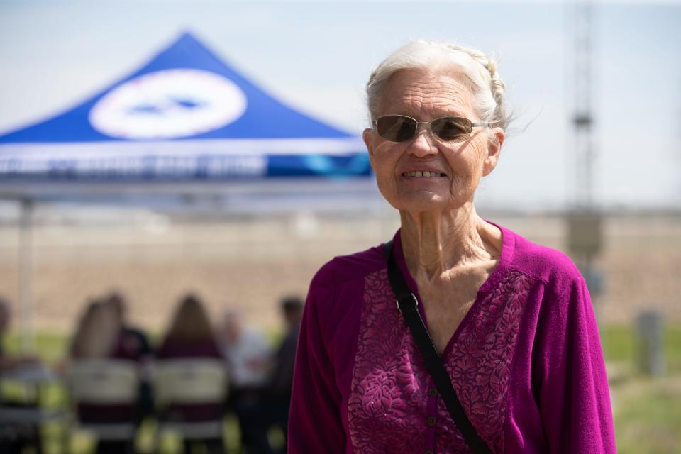 Melba Bruce poses for a photo during a picnic event at the National Weather Service Topeka office last week. In July 1993, Bruce, a volunteer weather observer, measured the water levels of the Solomon River every 2-3 hours for 23 straight days.
