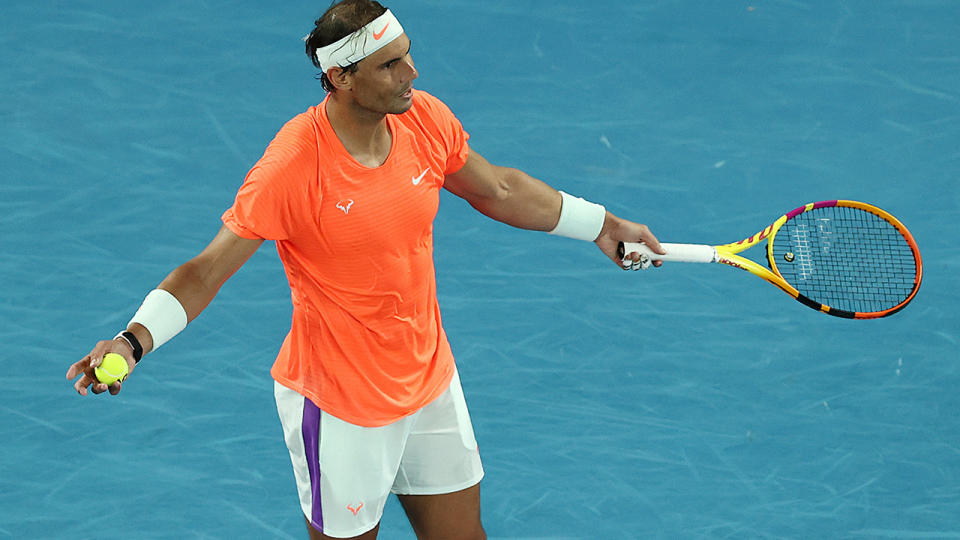 Rafael Nadal, pictured here reacting to the woman's abuse at the Australian Open. 