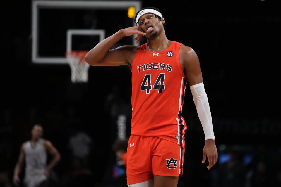 Auburn's Dylan Cardwell gestures during the second half of the team's NCAA college basketball game against St. Bonaventure in the final of the Legends Classic tournament Friday, Nov. 17, 2023, in New York. (AP Photo/Frank Franklin II)