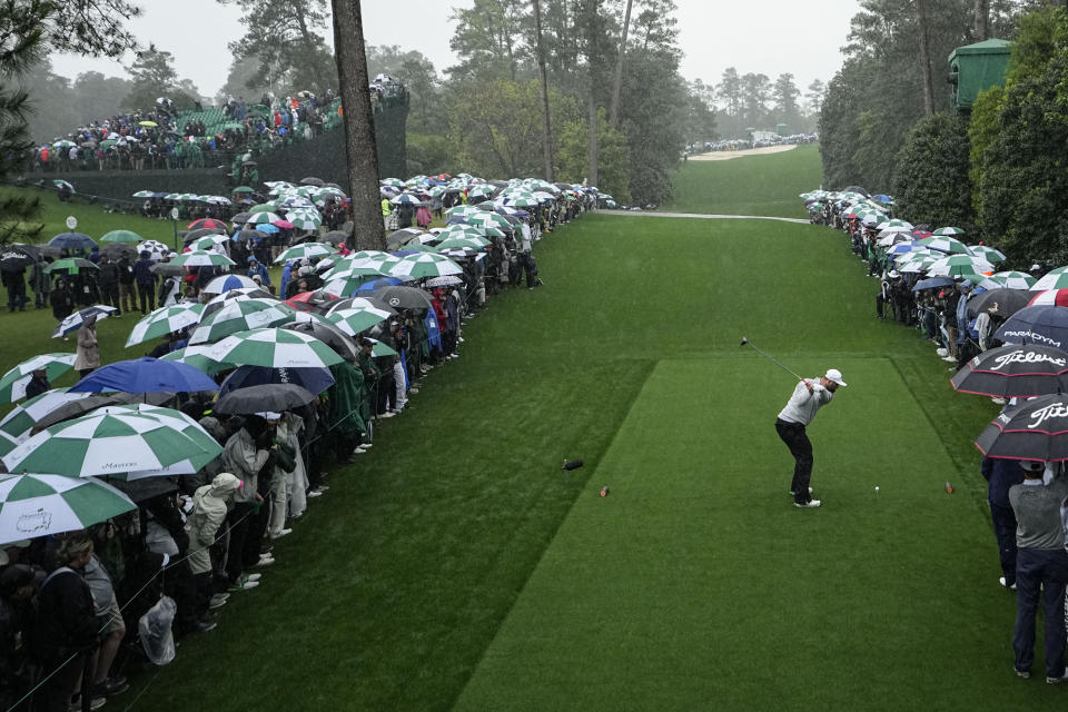 Jon Rahm, of Spain, hits his tee shot on the 18th hole during the weather delayed second round of the Masters golf tournament at Augusta National Golf Club on Saturday, April 8, 2023, in Augusta, Ga. (AP Photo/David J. Phillip)