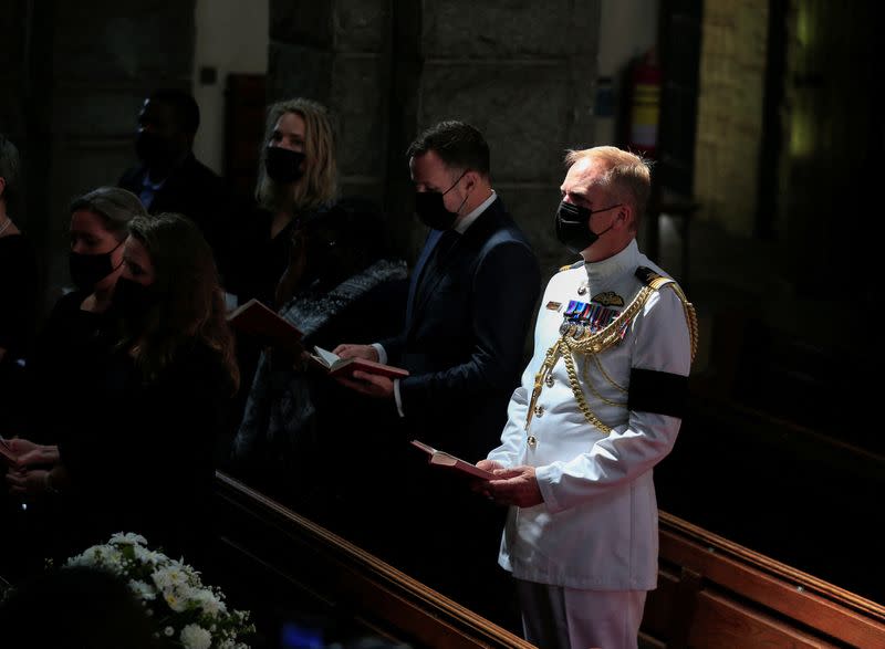 Congregants attend a memorial service for the late Queen Elizabeth in Zimbabwe