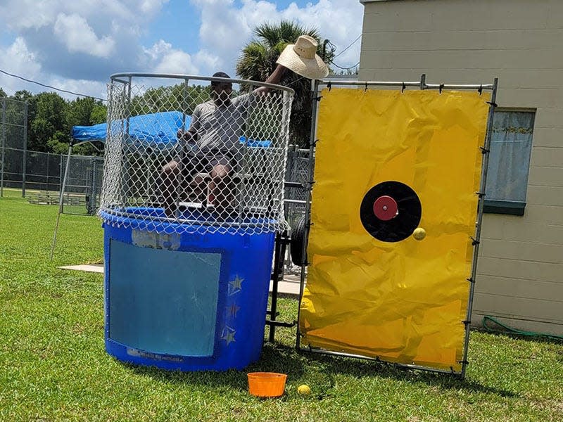 The celebrity dunk tank sponsored by Great Expectations Realty was busy all day during the Hello Summer! Hastings Main Street Market event on June 25 in Hastings. The Rotary Club of Hastings holds a quarterly gathering in downtown Hastings.