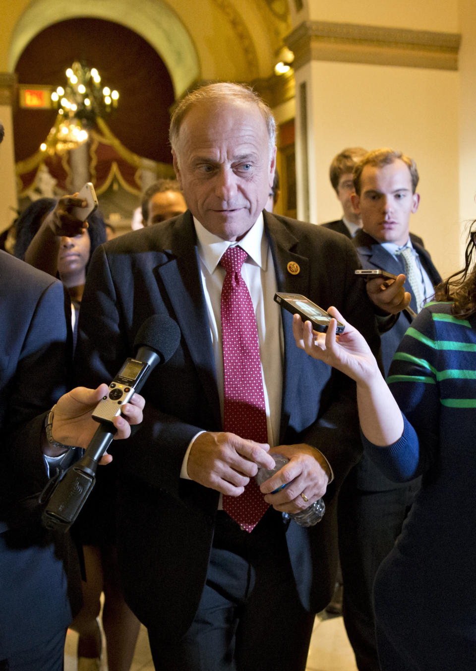 Rep. Steve King, R-Iowa, walks from House Speaker John Boehners office with reporters asking questions, at the Capitol in Washington, Tuesday, Oct. 15, 2013. (AP Photo/J. Scott Applewhite)