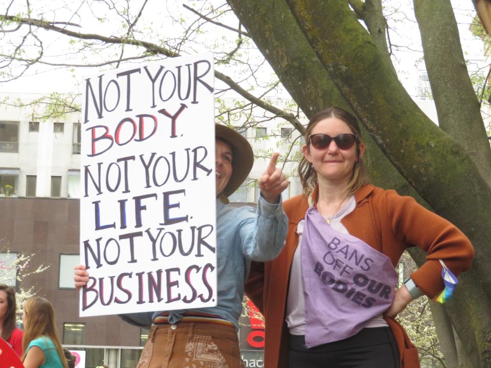 People protest on the Ithaca Commons after a draft opinion of a Supreme Court vote to overturn Roe v. Wade was leaked to the public.