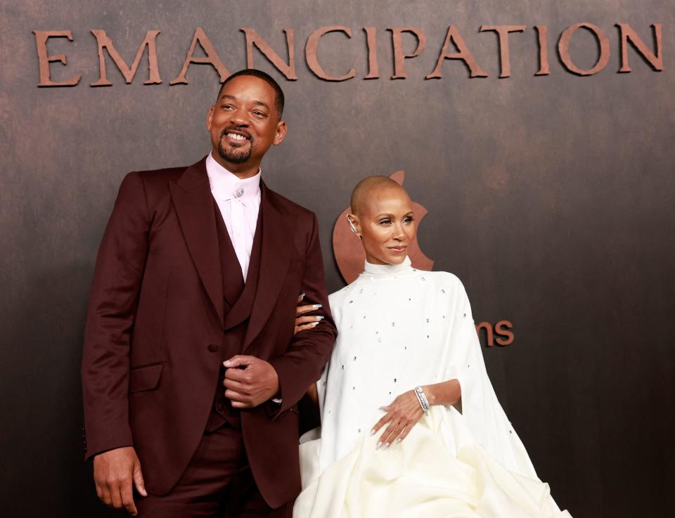 US actor Will Smith and his wife actress Jada Pinkett Smith arrive for the premiere of Apple Original Films' 