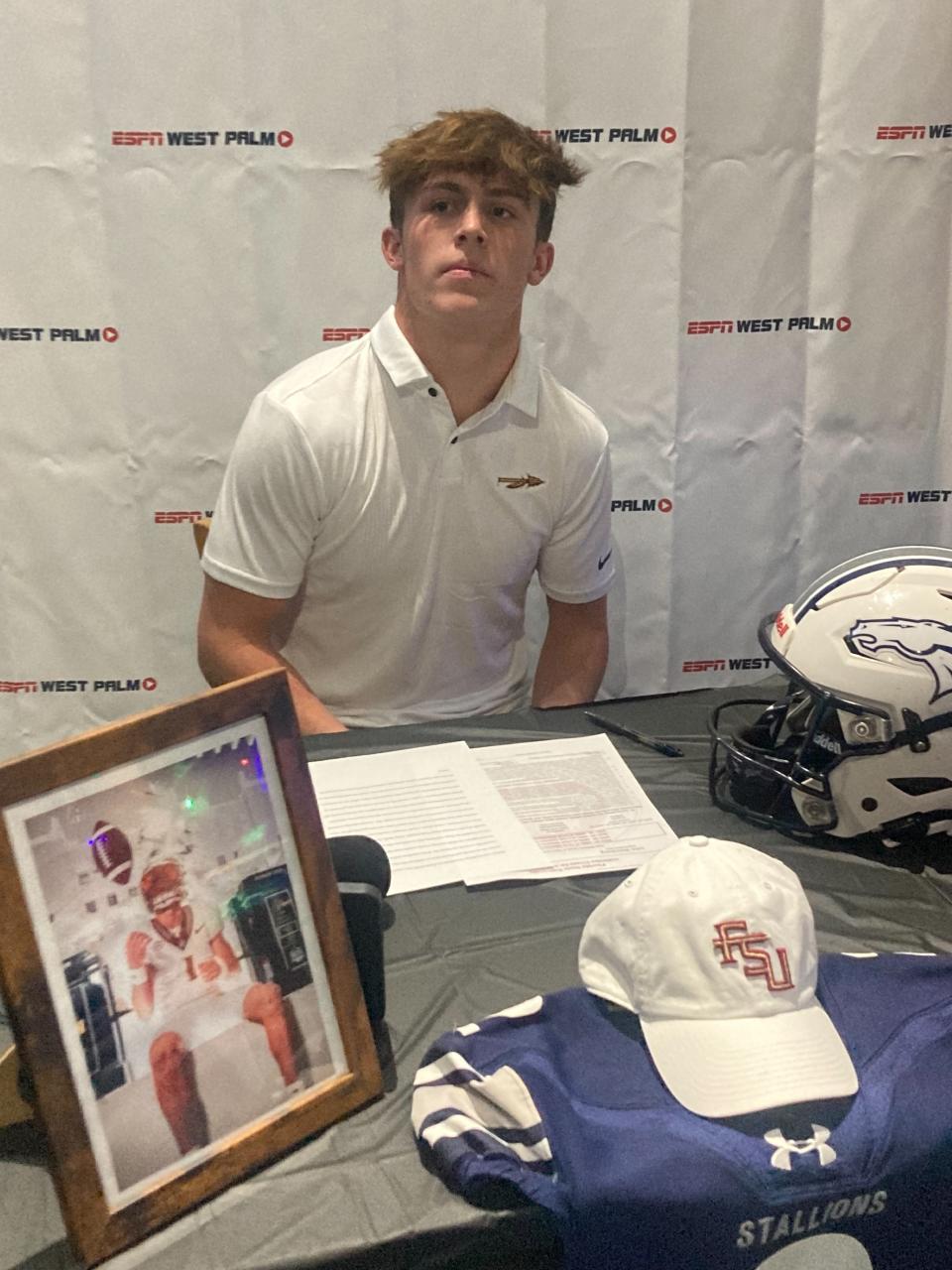 American Heritage-Delray kicker Jake Weinberg signs to continue his football career with Florida State in a ceremony on Dec. 20, 2023 in Delray Beach.
