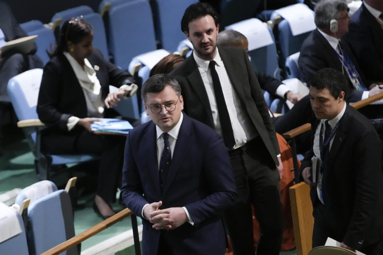 Ukrainian Foreign Minister Dmytro Kuleba walks through the General Assembly hall after addressing the eleventh emergency special session of the General Assembly, Wednesday, Feb. 22, 2023 at United Nations headquarters. (AP Photo/Mary Altaffer)