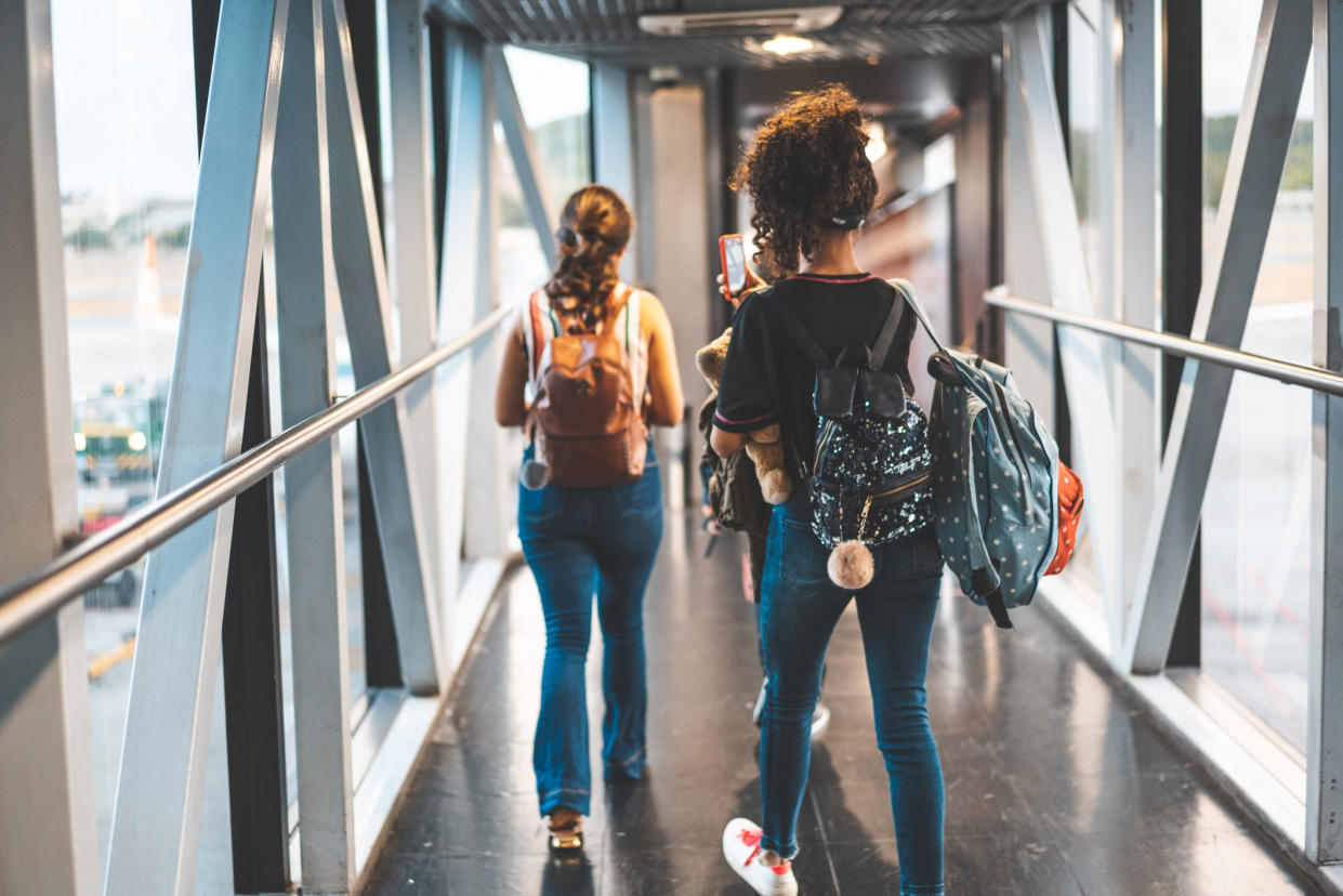 Group of teenagers travelling alone. (Getty Images)