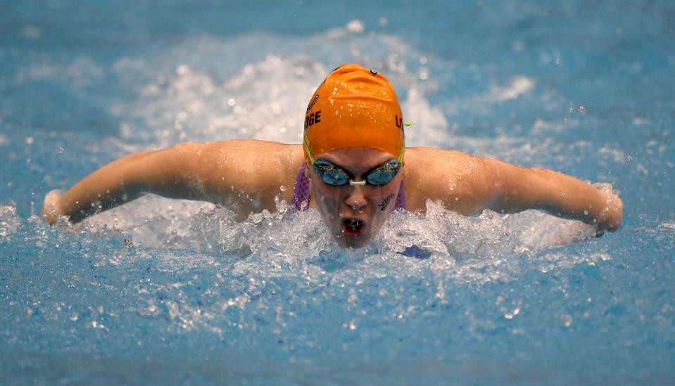 Hoover’s Marie Lochridge in the girls 100-yard butterfly in the Division I district meet at Cleveland State, Saturday, Feb. 17, 2024.