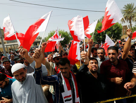 Supporters of Iraqi Shi'ite cleric Moqtada al-Sadr shout slogans during a demonstration in front of the Bahraini embassy in Baghdad, Iraq May 24, 2017. REUTERS/Wissm al-Okili