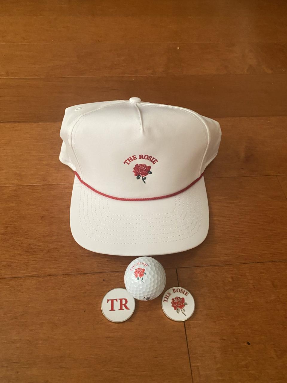 Inaugural The Rosie was held Monday at the Floridian Golf Club. Here are the hats, balls and markers used by the participants.