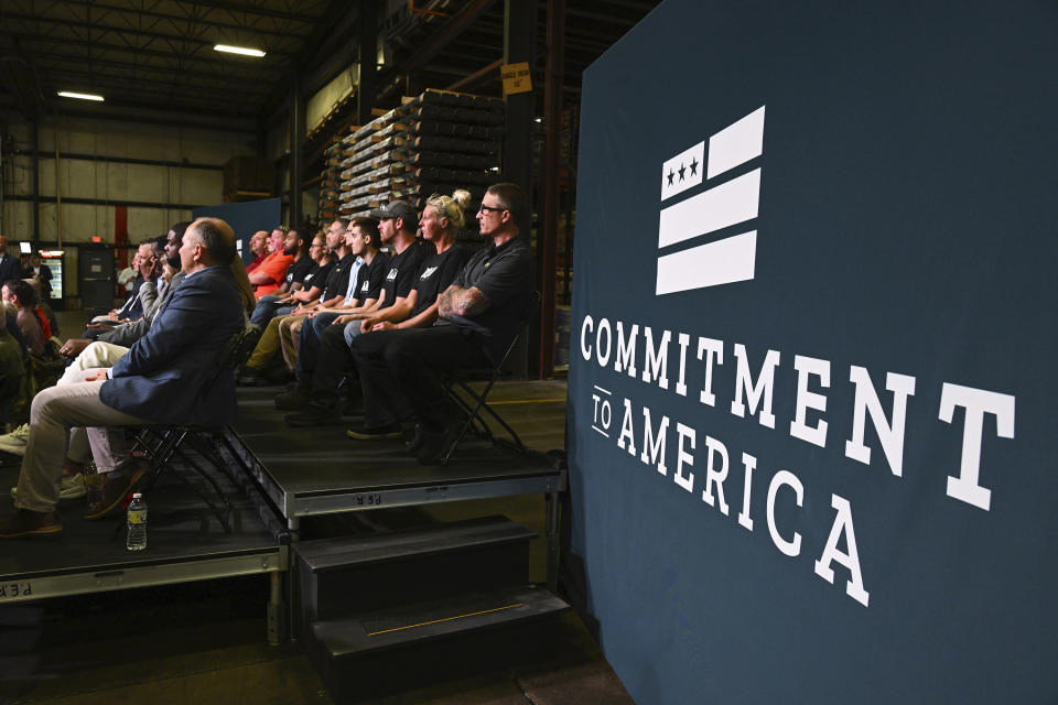 FILE - People listen as House Minority leader Kevin McCarthy, R-Calif., speaks at DMI Companies in Monongahela, Pa., Friday, Sept. 23, 2022. On Friday, Oct. 28, 2022, The Associated Press reported on stories circulating online incorrectly claiming an image shows the House Republicans’ “Commitment to America” plan, including raising the eligibility age for Medicare. (AP Photo/Barry Reeger, File)