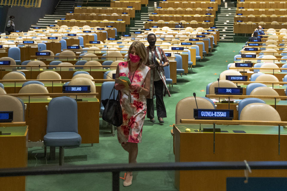 Norway's ambassador to the United Nations, Mona Juul, prepares to cast a vote during U.N. elections, Wednesday, June 17, 2020, at U.N. headquarters in New York. Norway and Ireland won contested seats on the powerful U.N. Security Council Wednesday in a series of U.N. elections held under dramatically different voting procedures because of the COVID-19 pandemic. (Eskinder Debebe/UN Photo via AP)