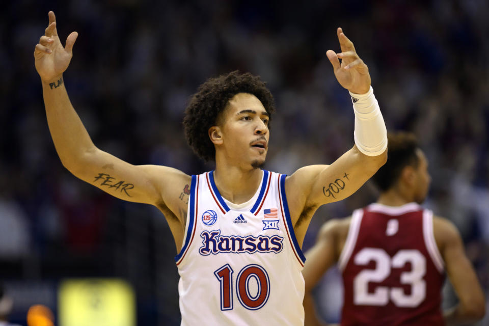 Kansas forward Jalen Wilson (10) celebrates a play against Indiana during the first half of an NCAA college basketball game in Lawrence, Kan., Saturday, Dec. 17, 2022. (AP Photo/Reed Hoffmann)