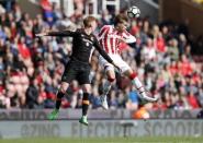 Britain Soccer Football - Stoke City v Hull City - Premier League - bet365 Stadium - 15/4/17 Stoke City's Marc Muniesa in action with Hull City's Sam Clucas Action Images via Reuters / Carl Recine Livepic