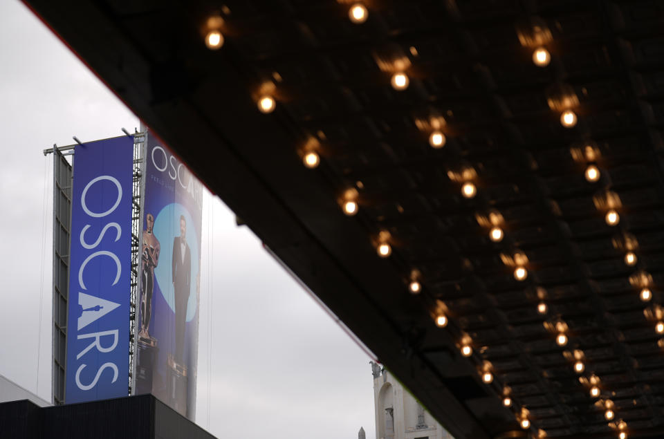 A sign advertising the 96th Academy Awards telecast is pictured on Hollywood Blvd. near the Dolby Theatre, Wednesday, March 6, 2024, in Los Angeles. (AP Photo/Chris Pizzello)