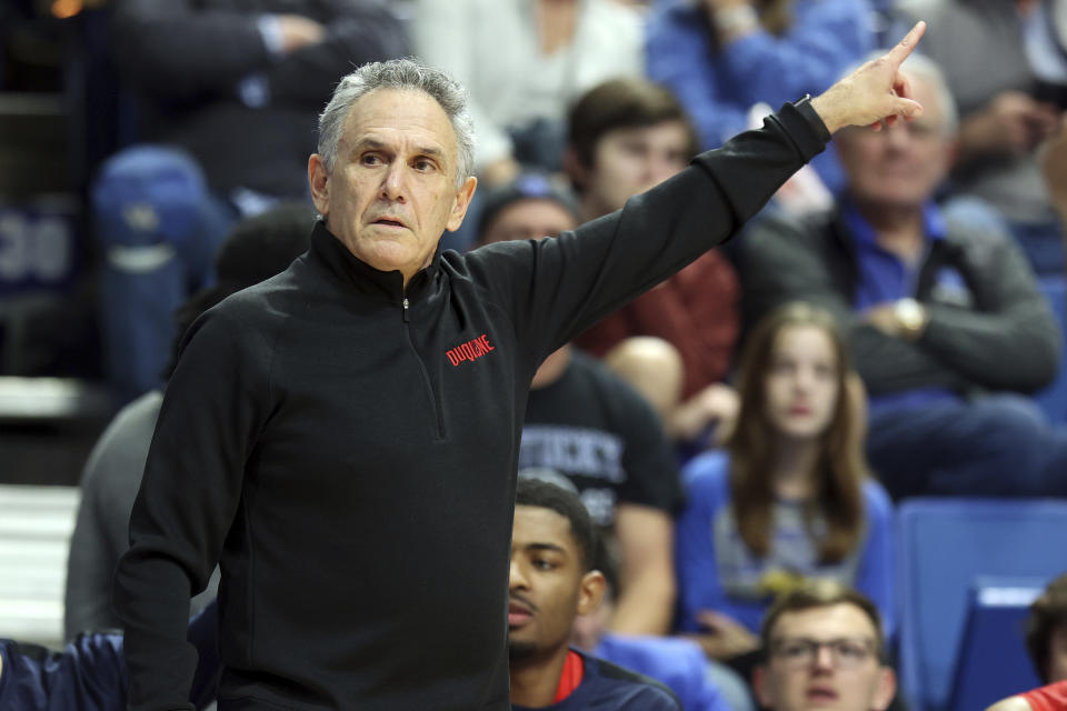 Duquesne head coach Keith Dambrot directs his team during the first half of an NCAA college basketball game against Kentucky in Lexington, Ky., Friday, Nov. 11, 2022. (AP Photo/James Crisp)