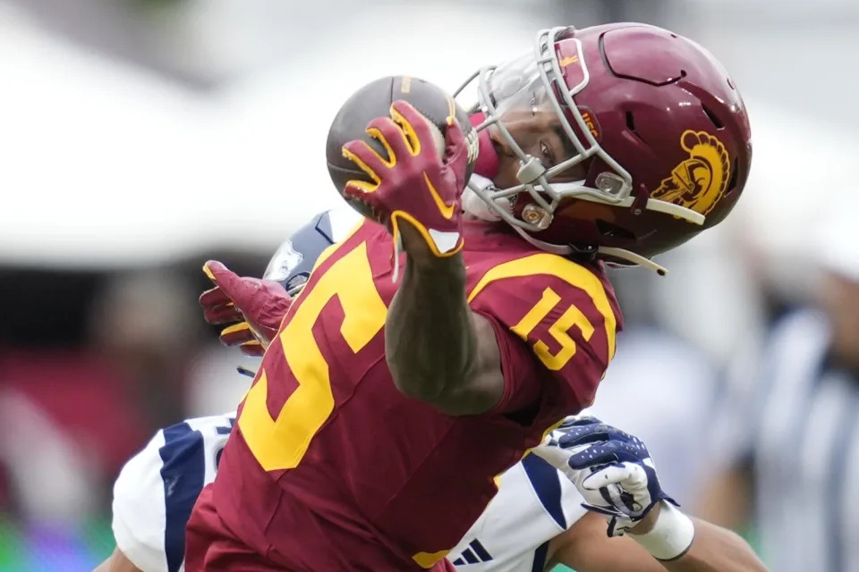 USC wide receiver Dorian Singer catches a pass against Nevada on Sept. 2.