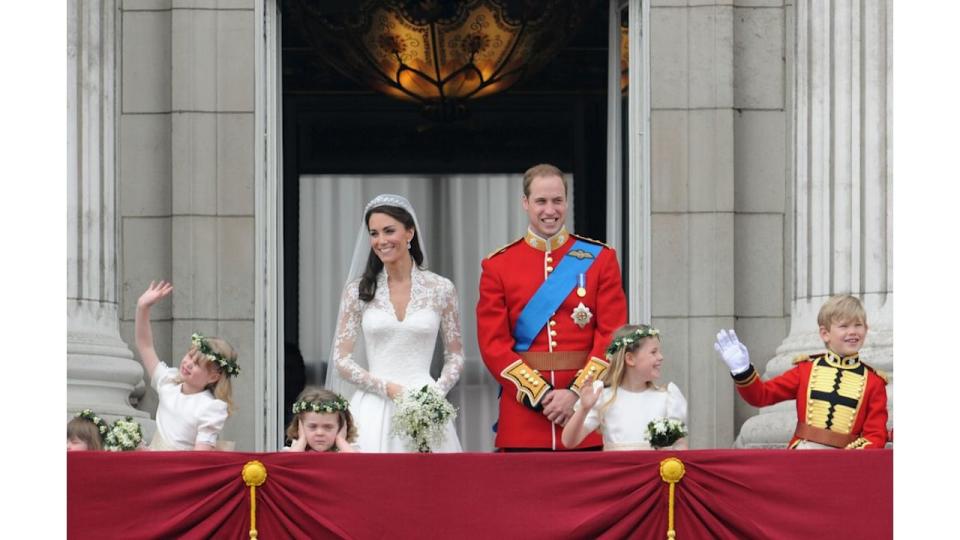 The Prince and Princess of Wales with their bridesmaids on the Buckingham Palace balcony