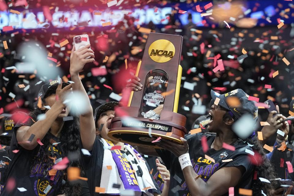 LSU players celebrate after the NCAA Women's Final Four championship basketball game against Iowa Sunday, April 2, 2023, in Dallas. LSU won 102-85 to win the championship. (AP Photo/Darron Cummings)