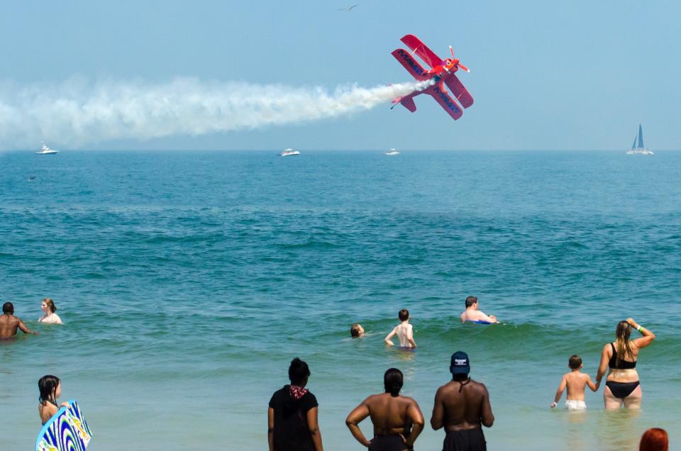 Mike Wiskus of Lucas Oil performs a drmo for crowds during the Ocean City Air Show on Sunday afternoon.