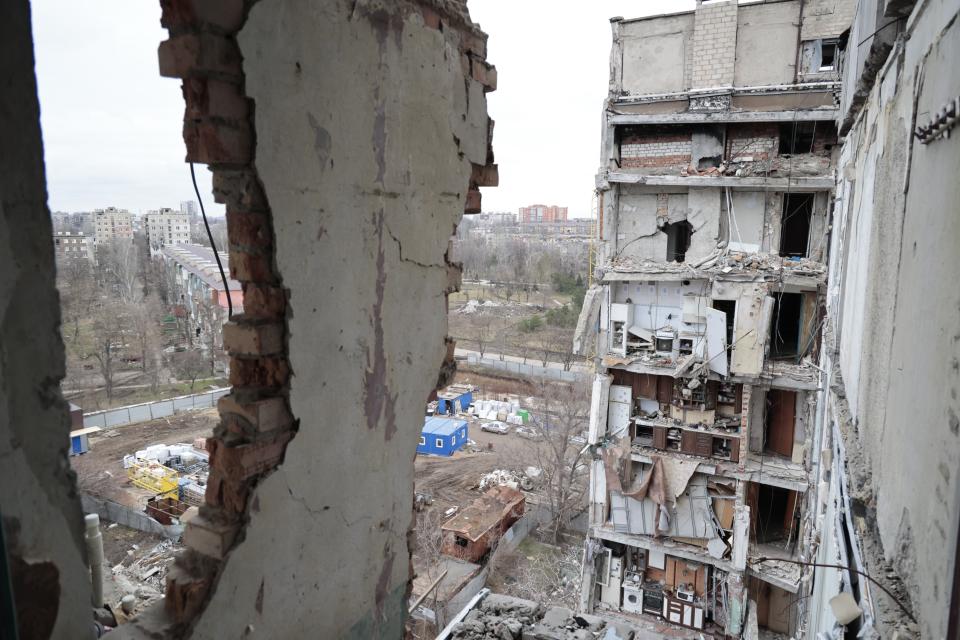 A view of an apartment building, damaged during a heavy fighting, in Mariupol, in Russian-controlled Donetsk region, eastern Ukraine, Thursday, Jan. 5, 2023. (AP Photo/Alexei Alexandrov)