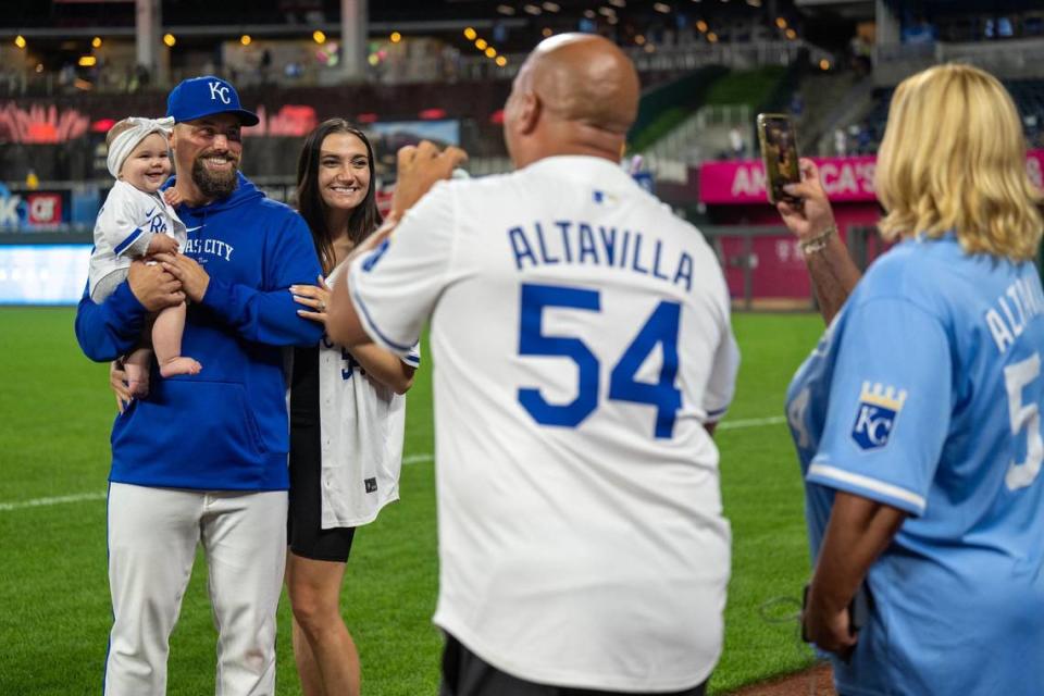 It was a family affair at Kauffman Stadium as Kansas City Royals pitcher Dan Altavilla (54), with wife Kat, held their 6-month-old daughter, Elle, as his parents, Dan and Colleen Altavilla of Pittsburgh, Pennsylvania, took photos on Wednesday, June 12, 2024, at Kauffman Stadium.