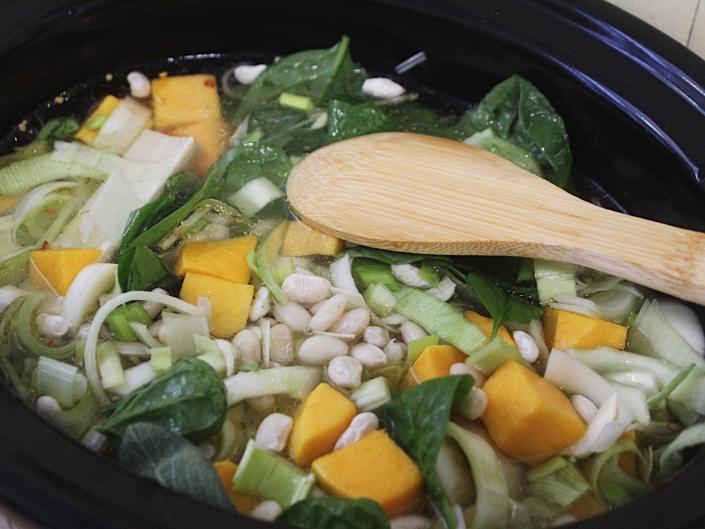 ingredients for white bean soup in a slow cooker